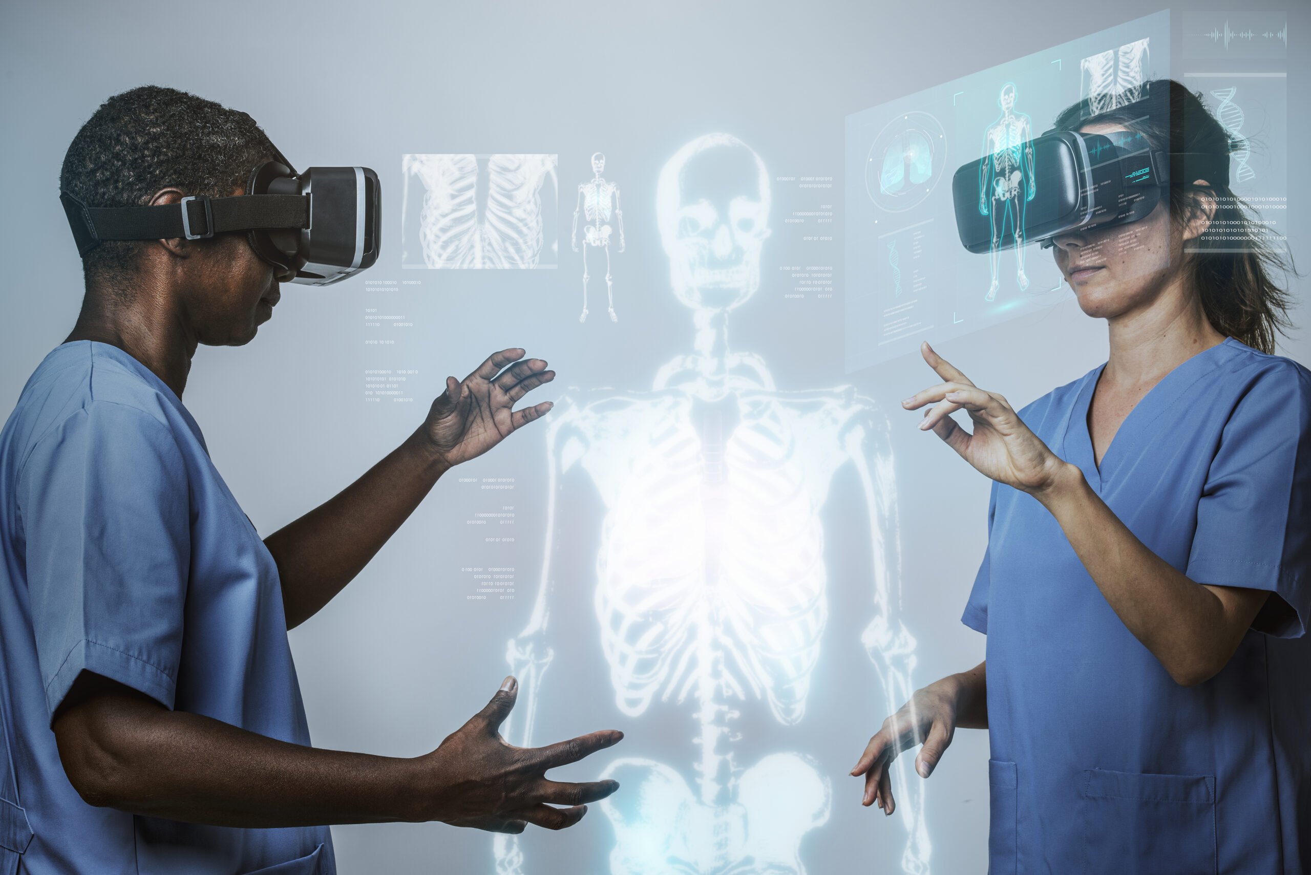 Doctors wearing VR simulation with hologram tech Hynd groupa